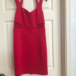 Red cocktail dress by Guess.